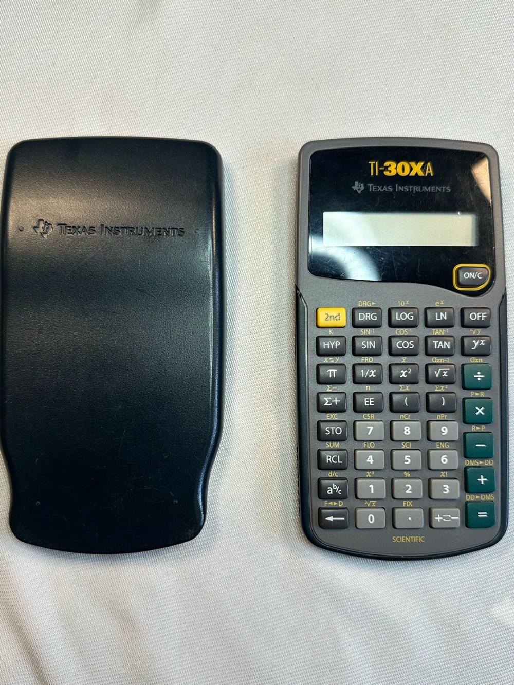 Texas Instruments TI-30XA Scientific Calculator in Black, Gray, Yellow, and Teal